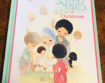 PRECIOUS MOMENTS of Christmas. nine stories to celebrate the season. 1990 book. Ships from Canada