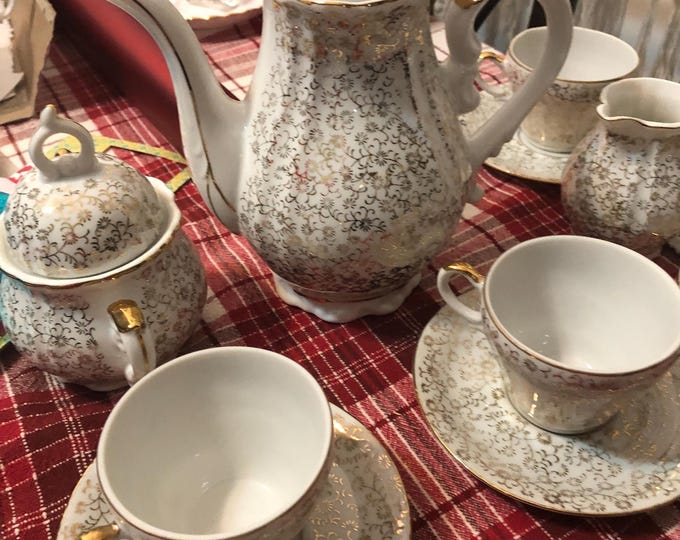 Antique Tea set, from the 50’s Made in JAPAN. GOLD and WHITE porcelain. 5 cups and saucers Miniature size.