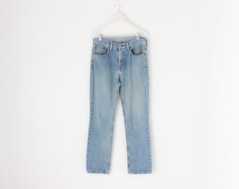 Vintage LEVIS 516s Light Stonewash Azul Clásico Botón de Pierna Recta Fly Red Tab Denim Jeans - Hombres / Unisex