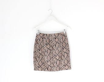 Minigonna aderente in PVC effetto pelle di serpente e pitone, anni 2000