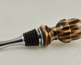 A beautiful bottle stopper in acrylic.