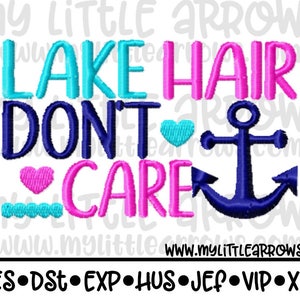 May include: A design with the text "LAKE HAIR DON'T CARE" in turquoise, pink, and navy blue. The design includes a navy blue anchor, a pink heart, a turquoise heart, and a turquoise wave. The website address www.mylittlearrows.com is at the bottom.