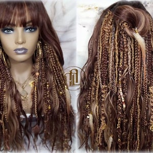 May include: A long brown wig with blonde highlights and braids. The wig has gold beads and charms woven into the braids.