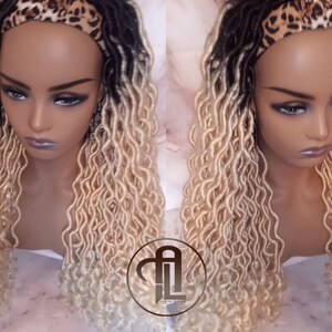 May include: A blonde and black ombre half wig with a leopard print headband. The wig is styled in long, loose, curly dreadlocks.