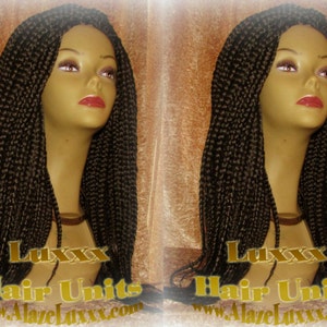 May include: A long, dark brown braided wig with a straight, even style. The wig is on a mannequin head with a light brown skin tone. The wig is styled in a way that the braids are all the same length and fall straight down the back of the head. The wig is labelled "Luxxx Hair Units" and "www.AlazelLuxxx.com".