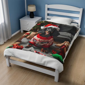 Snuggle Up with this Festive Fido The Cozy Velveteen Dachshund Blanket That is Pawsitively Perfect for the Holidays