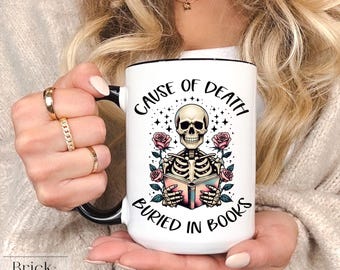 Booker Lover Skeleton Mug | Funny Gothic Coffee Mug | Cause of Death Buried in Books | Spooky Bookish Gift for Readers | Dark Academia Mug