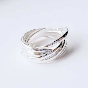 Argent sterling 7 anneaux roulants | Bague empilable en argent 925 | Bague de mariage russe en argent | Bande d’éternité en argent | 7 anneaux entrelacés