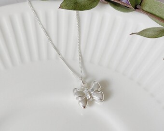 Sterling Silver Bow Necklace: Dainty Ribbon Pendant