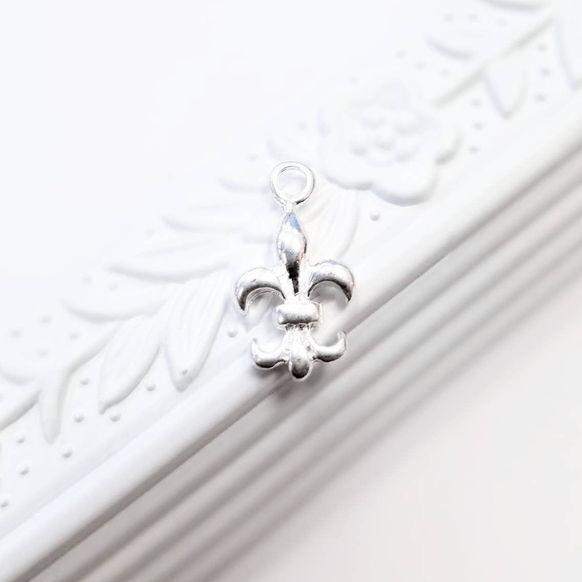 5 POINT FLEUR DE LIS STAR PENDANT w/ CZ – Royal Order