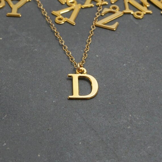 Gold chain with shop letter d