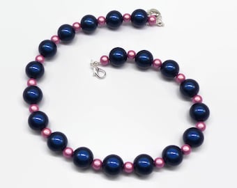 Collana vistosa con perline miracolose blu navy e rosa, accessorio da sposa luminescente che cambia colore.