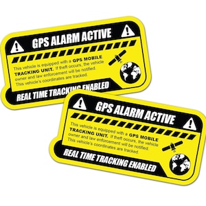 May include: Two yellow and black GPS alarm stickers. The stickers read "GPS ALARM ACTIVE" and "REAL TIME TRACKING ENABLED." The text also states the vehicle is equipped with a GPS mobile tracking unit.