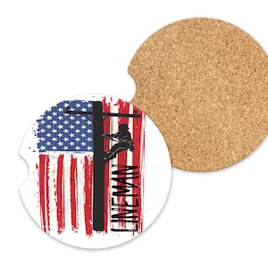 May include: A round white car coaster with a silhouette of a lineman climbing a utility pole in front of an American flag. The text "Lineman" is written vertically on the right side of the coaster.