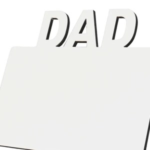 May include: White wooden sign with the word "DAD" in black lettering on top. The sign has a blank surface for personalization.