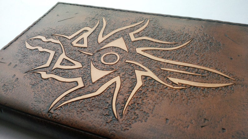 Handmade carved leather Dragon Age Inquisition A6 Notebook cover image 1