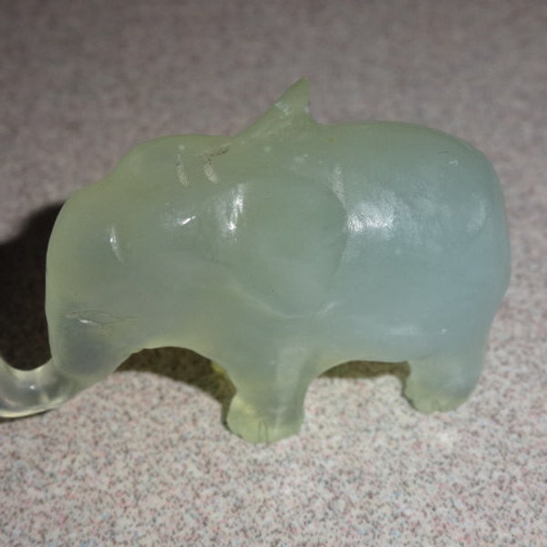 Jade Miniature Elephant Trunk is tilted up but not raised
