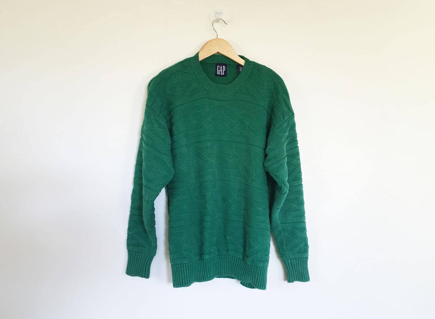 Early 80s style: Preppy monogrammed sweaters in kelly green and