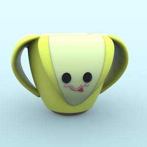 Pode incluir: Uma caneca de cerâmica amarela com duas alças e um rosto de desenho animado. A caneca tem olhos pretos, uma boca rosa e uma língua vermelha que está para fora.