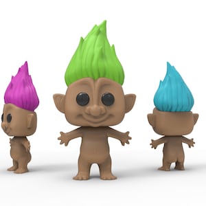 May include: Three troll dolls with different coloured hair. The troll on the left has pink hair, the troll in the middle has green hair, and the troll on the right has blue hair.