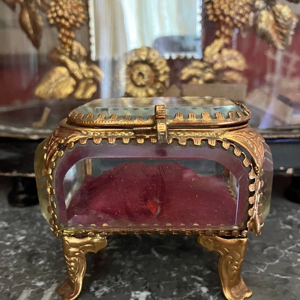 A gilt glass Vitrine, French, rectangular, bevelled glass, red buttoned cushion, vintage, jewellery box, casket.