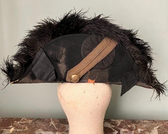 A Bicorne Hat, Royal Naval Officer’s hat, Napoleonic, 19th century, antique, Military Hat, worn, with fur, brass button, Ede & Ravenscroft.