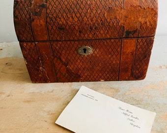 An antique Stationery Box, Victorian, red Moroccan leather, emerald green silk, fitted interior.