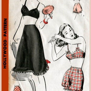 May include: Vintage sewing pattern for a two-piece swimsuit with a black top and skirt and a red and white gingham top and shorts. The pattern is for size 14, 32 bust, 35 hip. The pattern is from the Hollywood Pattern company.