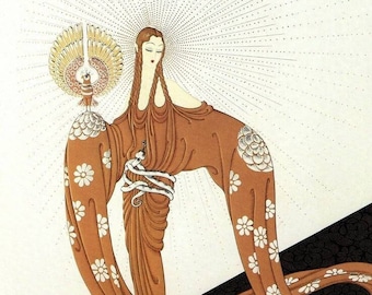 May include: A woman in a long, flowing brown dress with white floral accents stands against a black and white background. She holds a peacock feather fan in her right hand. The dress is adorned with a white floral pattern and the woman's hair is long and dark.
