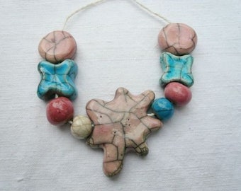 9 perline ceramica raku con grande perla centrale -perline ceramica per collana - per gioielli originali -idea regalo festa della mamma