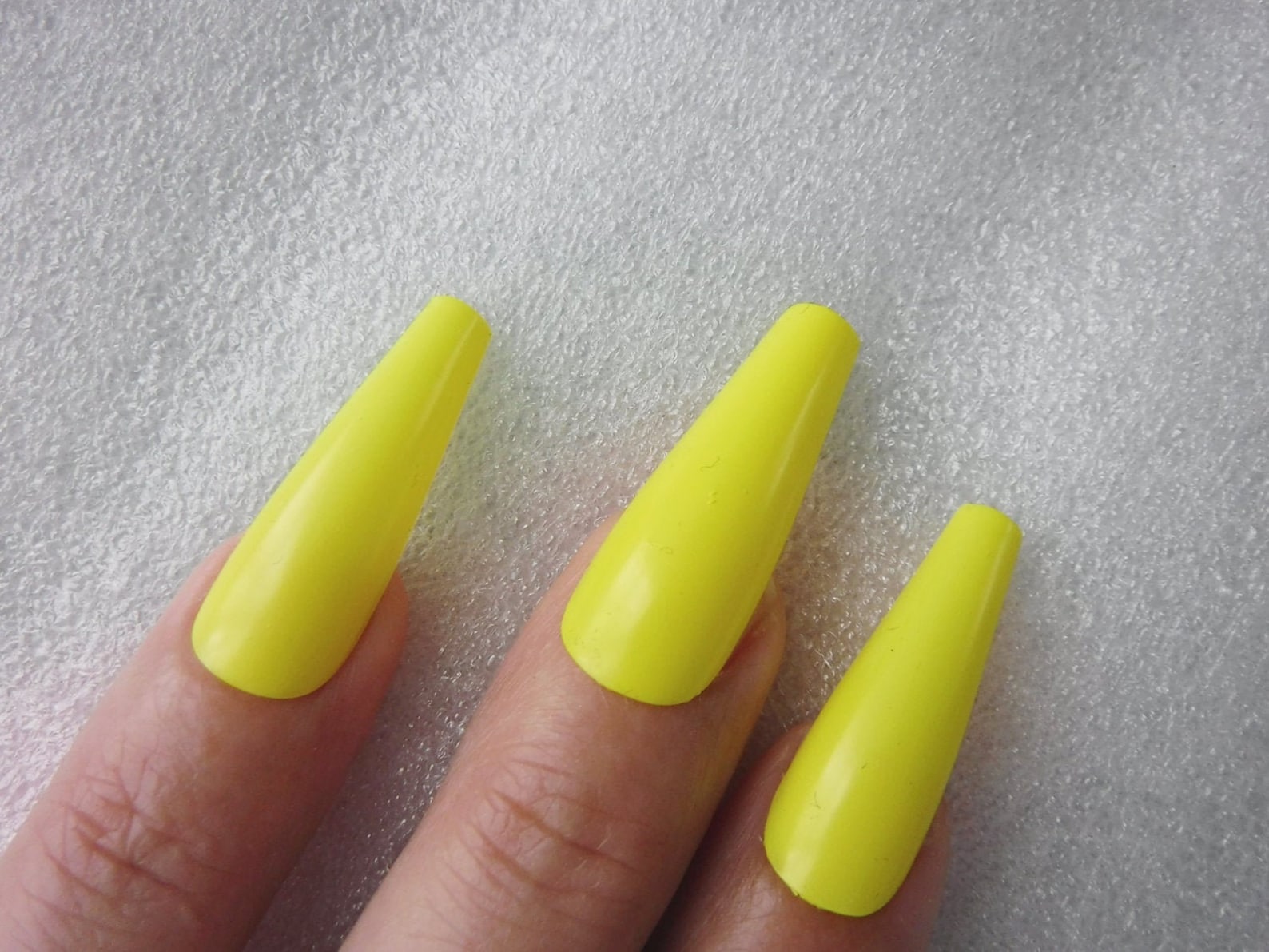 2. "Pastel Yellow Coffin Nails for Summer 2024" - wide 2