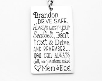 May include: Silver keychain with a rectangular tag that reads "Brandon DRIVE SAFE, Always wear your Seatbelt, Don't text & Drive. AND REMEMBER... you can ALWAYS call, no questions asked Mom & Dad".