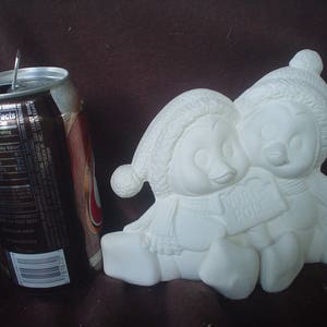 Ceramic Bisque 5" X 7" Cuddle Penguins with Sign - Ready to Paint - C587