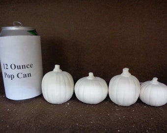 Four 1.75" - 2.5" Ceramic Bisque Pumpkins - E690