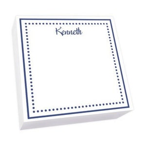 May include: White notepad with a navy blue dotted border and the name "Kenneth" printed in cursive on the front.