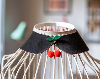 Cotton Peter Pan collar featuring two cherries as a closure