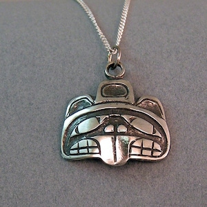 Sterling Silver Beaver Totem Pendant, design # 603, 5/8 inches tall, and 3/4 inches wide. Comes with 18 inch Sterling Chain.