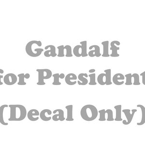 May include: Gandalf for President (Decal Only) - A gray decal with the text "Gandalf for President (Decal Only)"