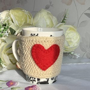 Chunky Knitted wool Cup cosy with felted heart on it, Chunky tea cozy,  Tea cup cozy, coffee cup cozy