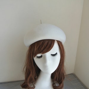 White beret lady autumn winter Briton with woollen felt hat top hat