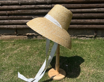 High flat top with large brim strap straw hat Fashion concave shape sun block beach straw hat