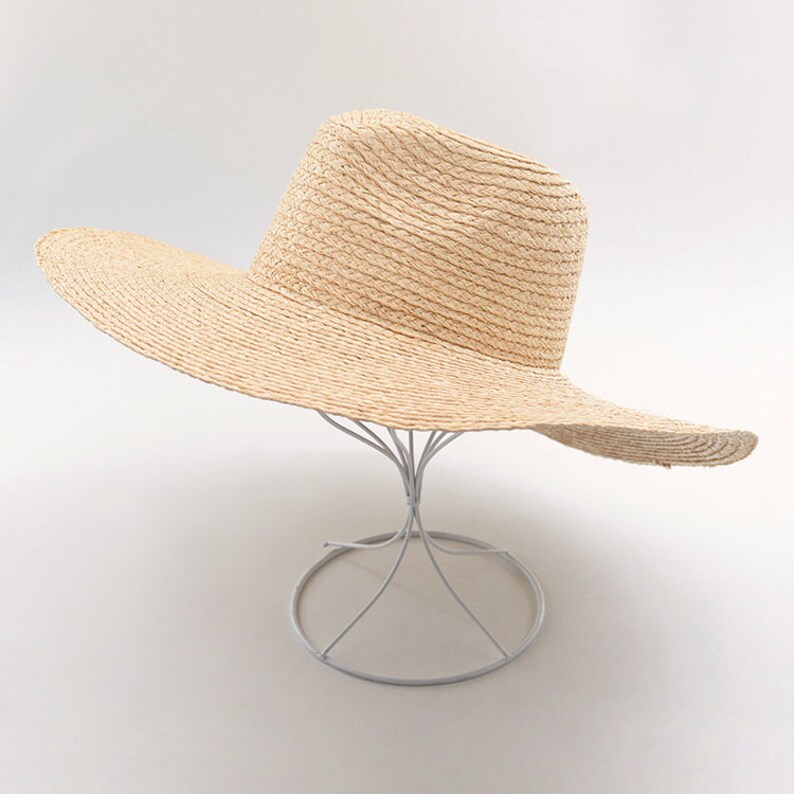New hollowed-out woven drooping large-brim sisal straw hat outdoor sunshade sun protection beach along the big pot straw hat