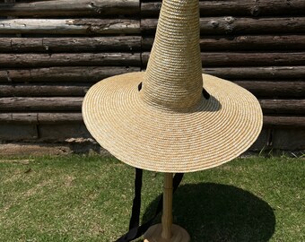 Dome Wide-brim Han Edition of Natural Grass Straw Beach Hat  display picture 1