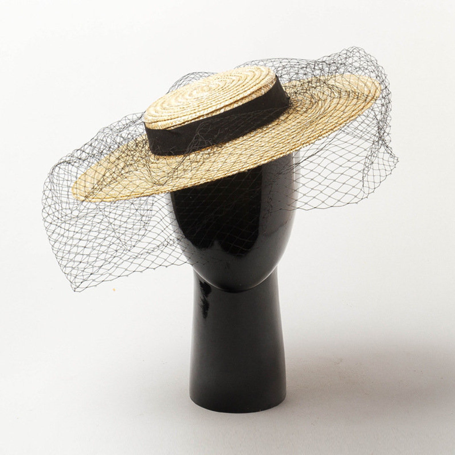 A Straw Hat With a Flat Top and Wide Eaves Decorated With Etsy