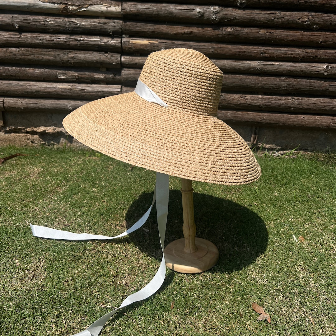 Flat-topped Large Curved Brim Hat With Binding Band Hand  display picture 1