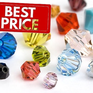 May include: A selection of multi-coloured faceted beads, including blue, red, yellow, and clear. A red tag with the words "BEST PRICE" is in the upper left corner. The beads are scattered on a white surface.