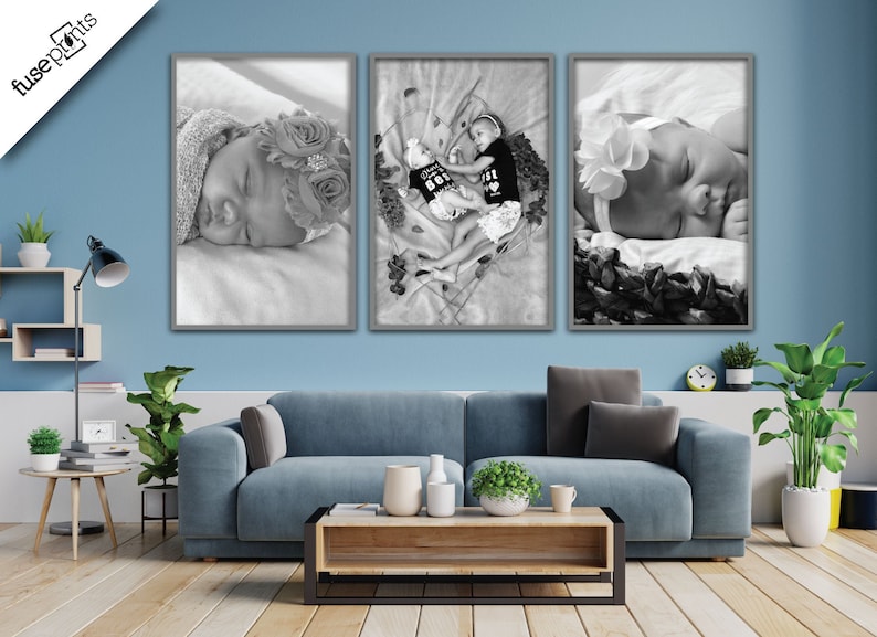 May include: Three black and white framed photos of babies. The photo on the left shows a baby sleeping with a flower crown. The middle photo shows two babies, one wearing a "This is my best friend" shirt and the other wearing a "Best friend" shirt. The photo on the right shows a baby sleeping with a flower headband.