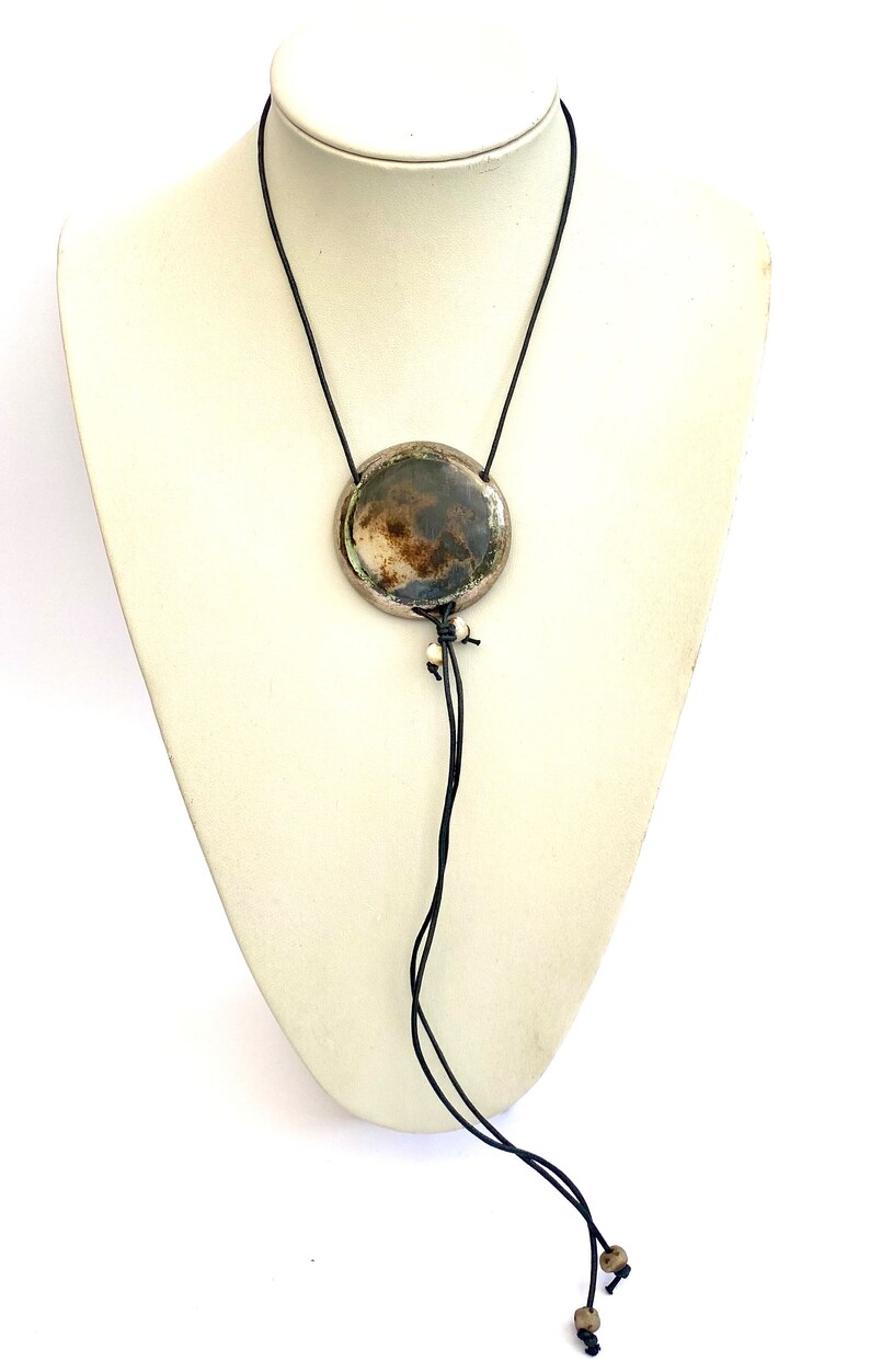 Ceramic pendant. Unique smoke-fired round adjustable necklace with silver lustre. Special gift. image 7