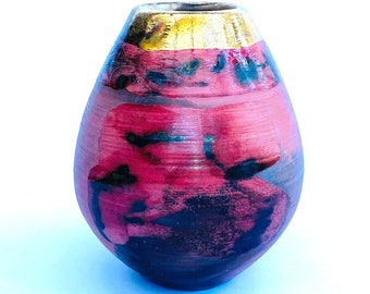 Red smoke-fired ceramic pot with gold lustre. special gift or enhance a contemporary interior.