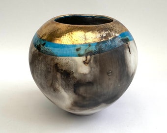 Ceramic smoke-fired vase with blue glaze and gold lustre. Luxury gift for a special occasion.